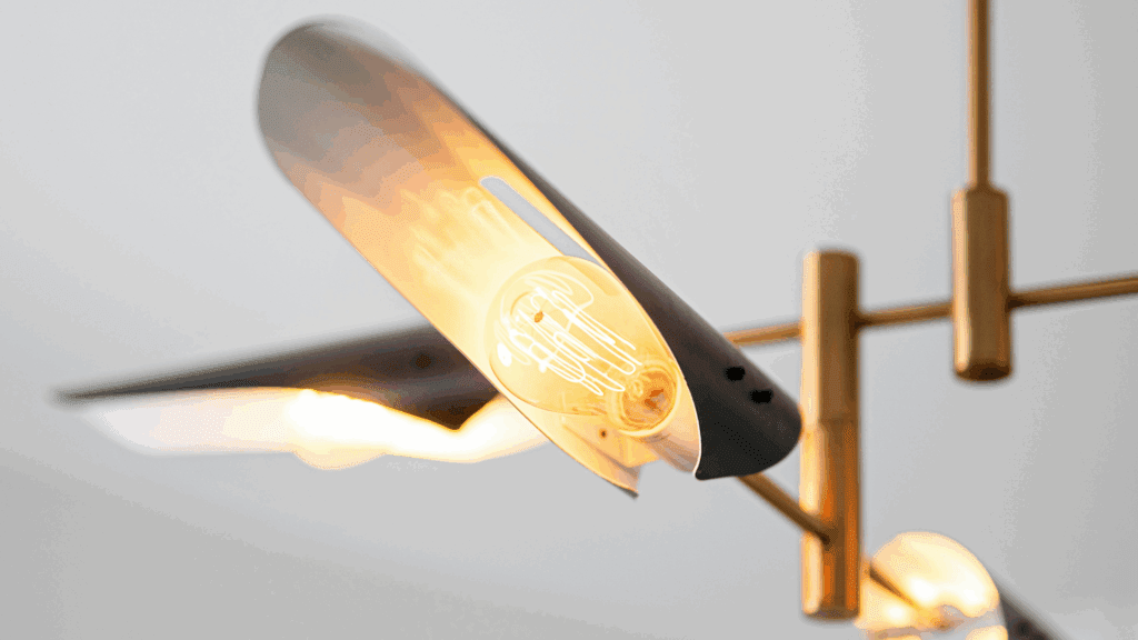 Warm metallic finishes in modern luxury interior design - gold bronze accents